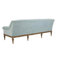Light blue sofa, rear view, decorative legs.