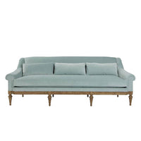 Light blue sofa, front view, decorative legs.