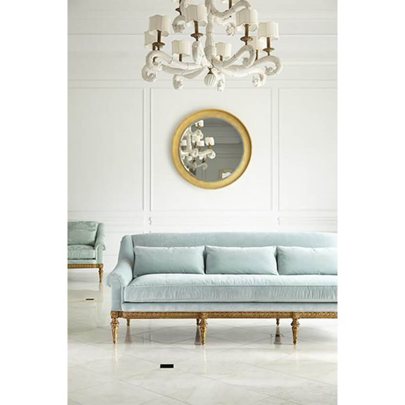 Light blue sofa in elegant room setting.