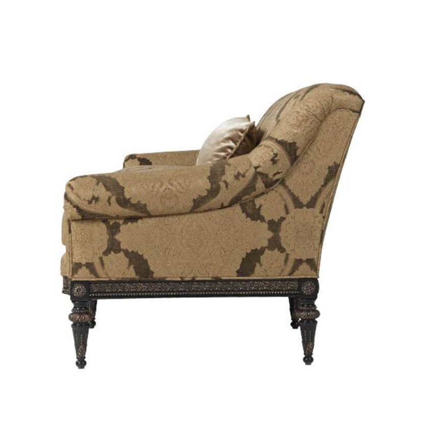 Patterned brown sofa, side view, decorative legs.