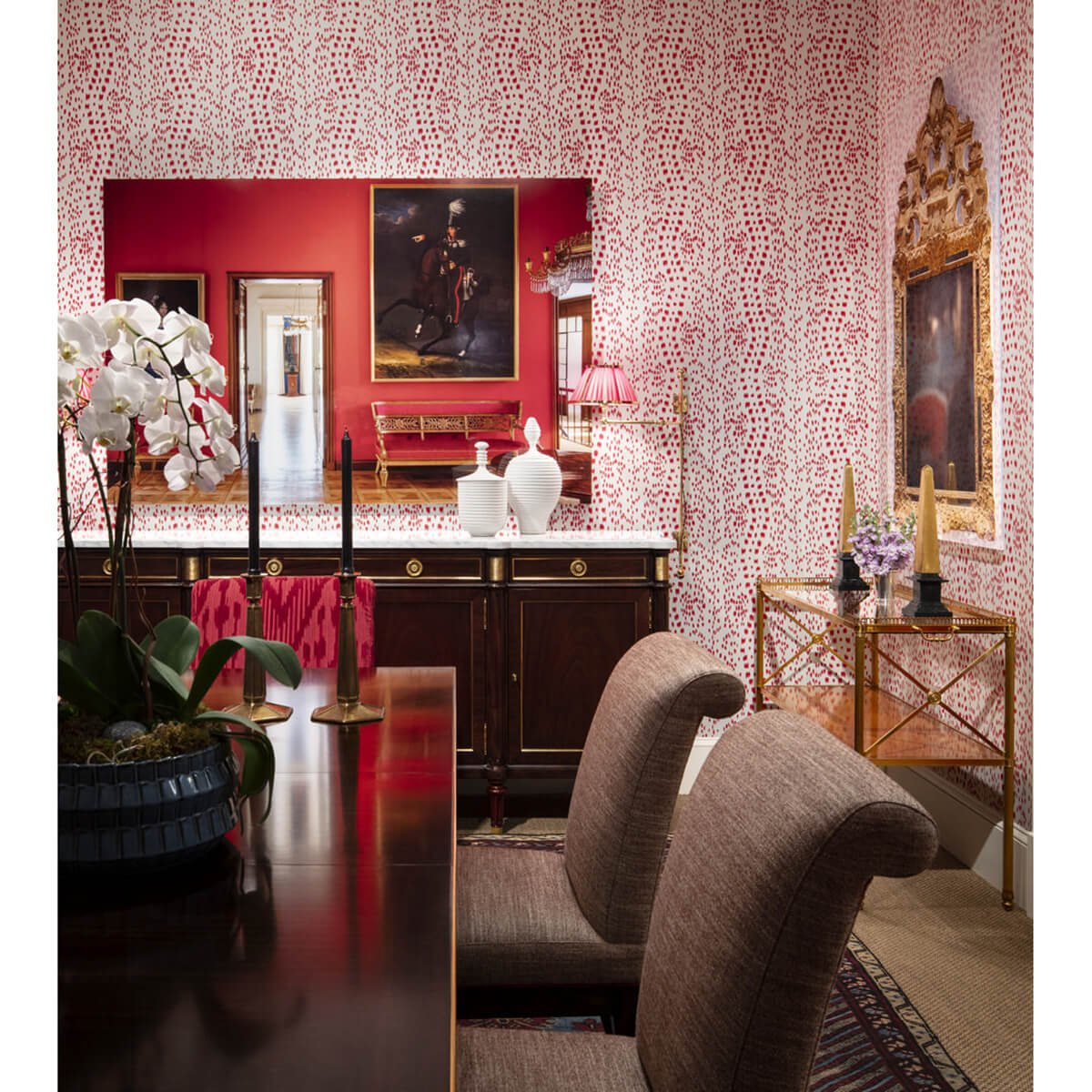 Dining room featuring Louis XVI style French buffet and decor.