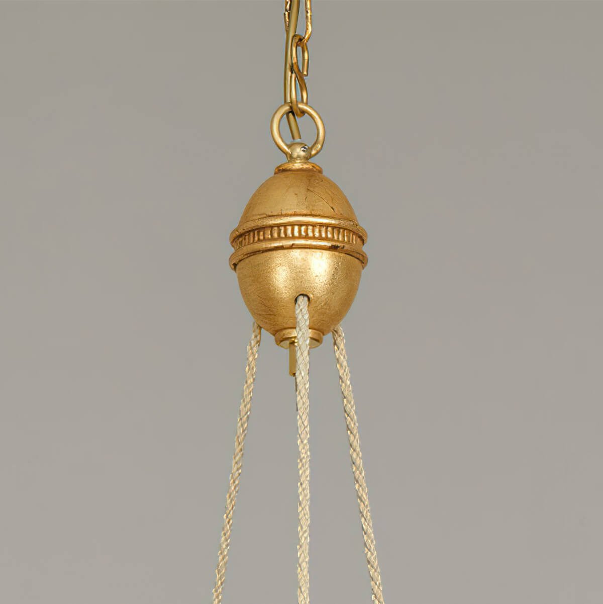 Top connection detail of Louis XVI chandelier suspension.