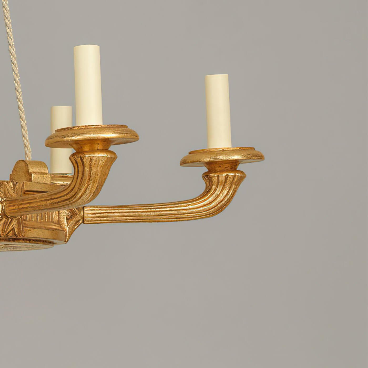 Side view of Louis XVI chandelier arm and candle holders.