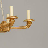 Side view of Louis XVI chandelier arm and candle holders.