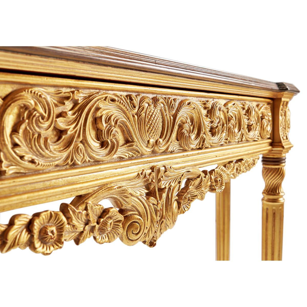 Intricate carvings on Louis XVI console table apron.