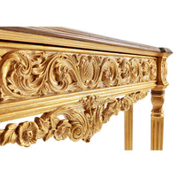 Intricate carvings on Louis XVI console table apron.