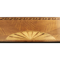 Inlay design on Louis XVI console table surface.
