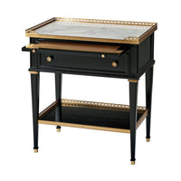 Nightstand drawer open showcasing black and gold details.