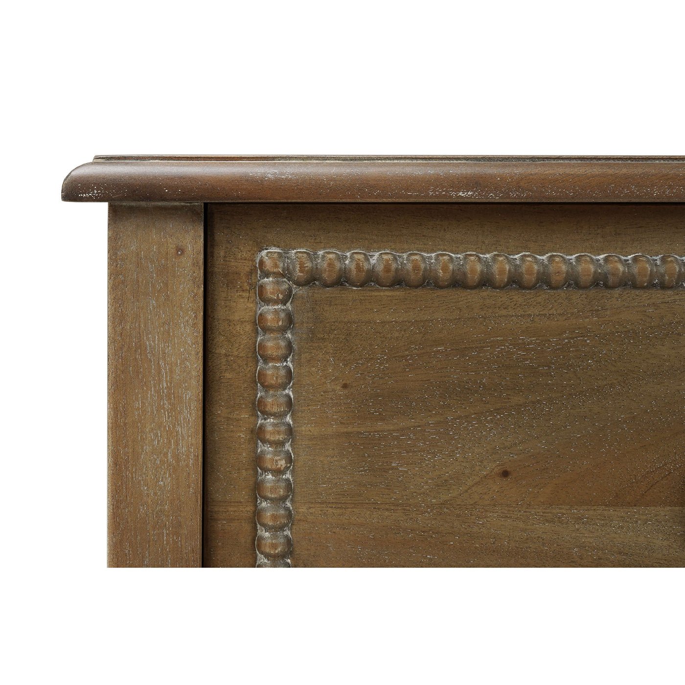 Close-up of nightstand edge and drawer detail.