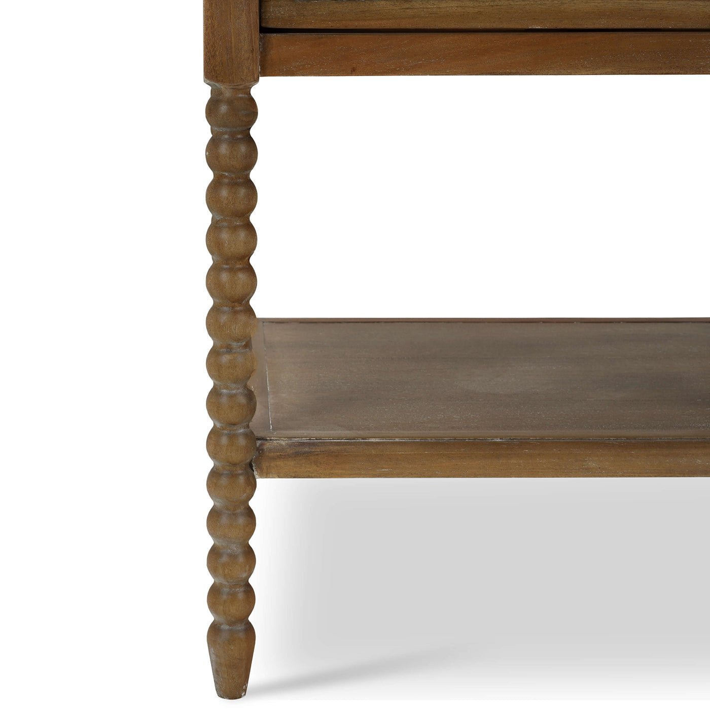 Close-up of nightstand leg design and lower shelf.