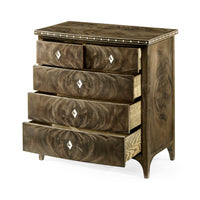 Mahogany bowfront chest with partially open drawers.