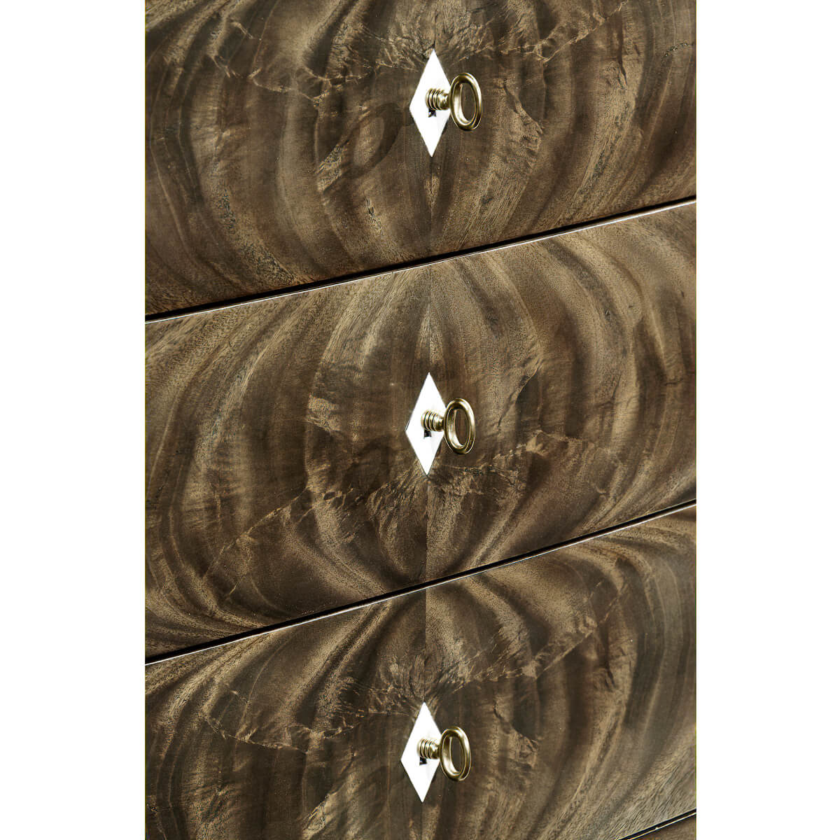 Close-up on mahogany bowfront chest drawer handles.