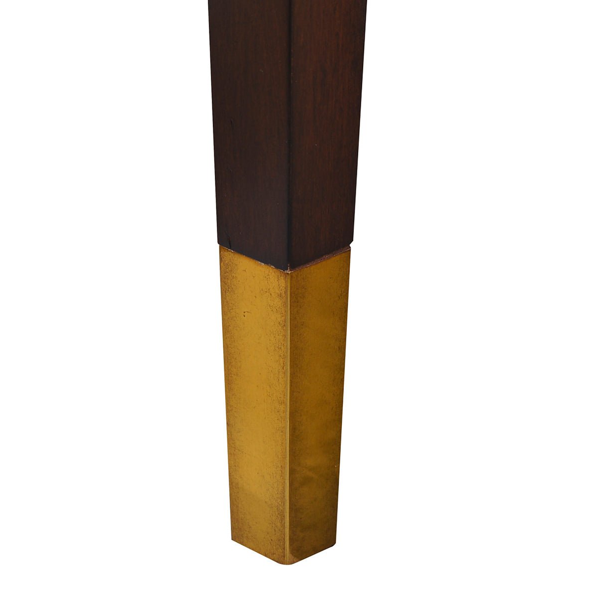 Golden leg detail on mahogany classic console table.