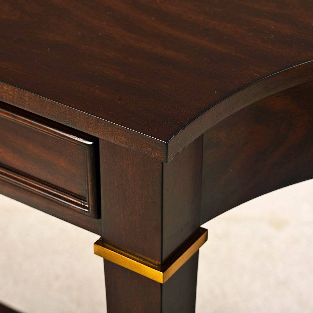 Corner detail of mahogany classic console table.
