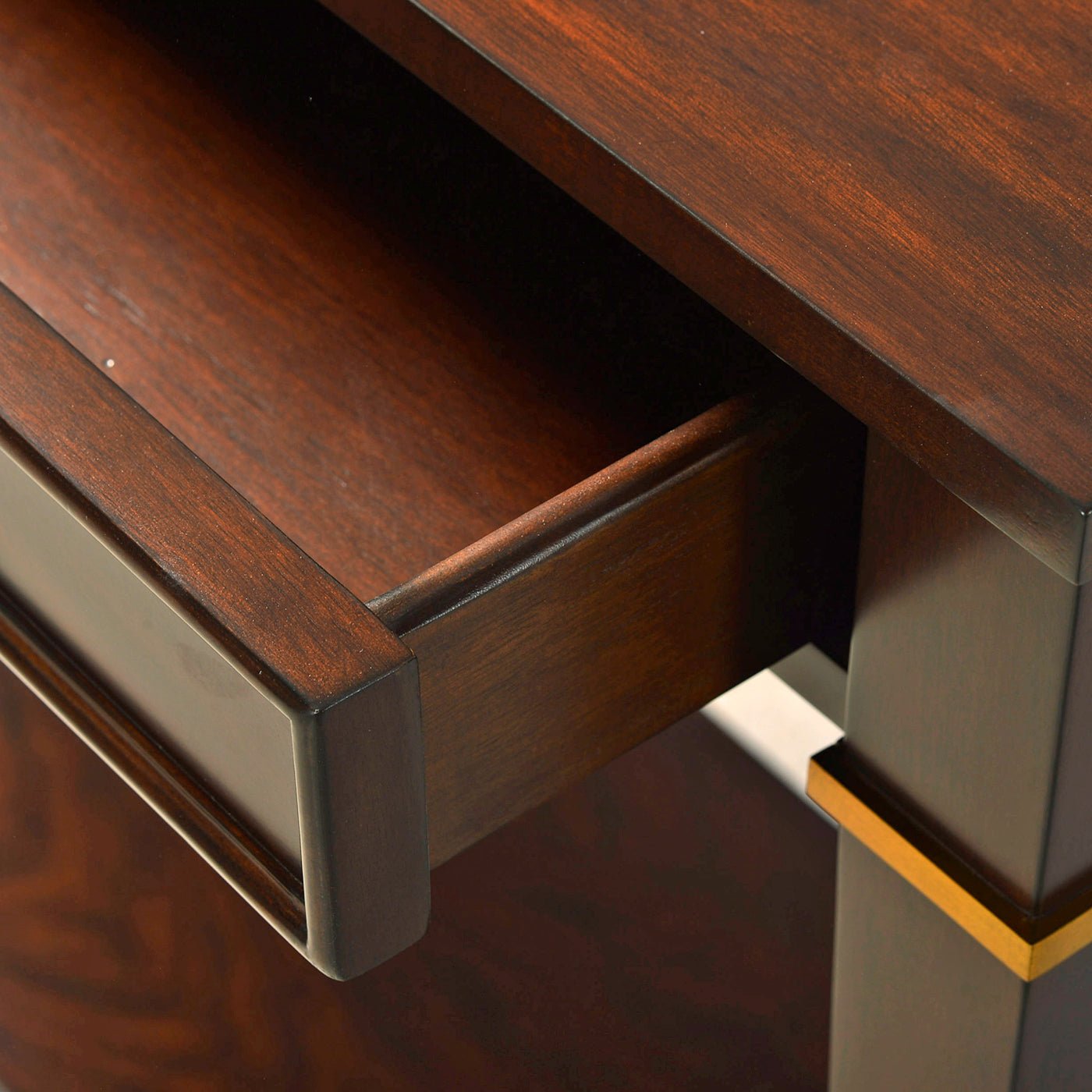 Drawer interior of mahogany classic console table.