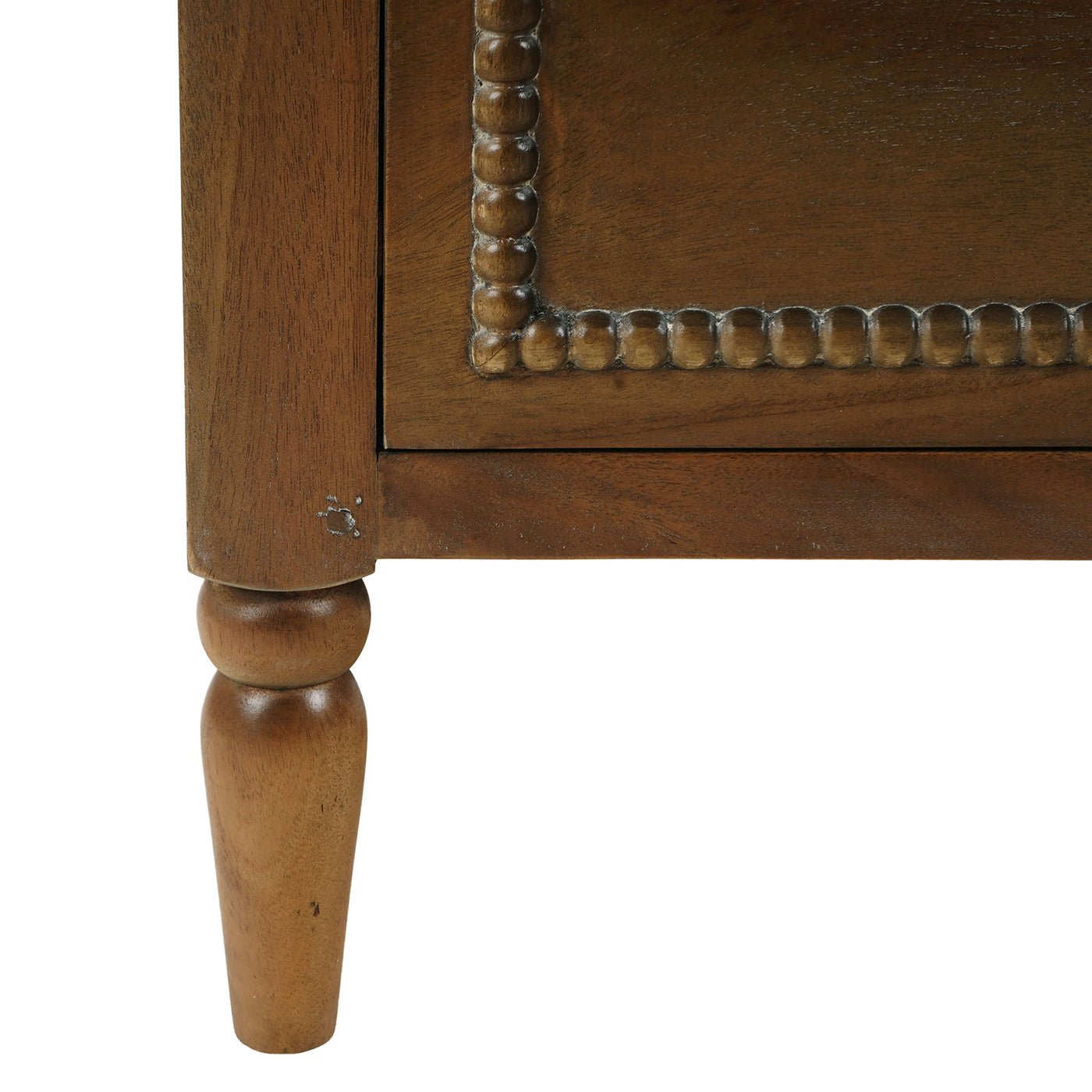 Close-up of mahogany chest leg detail.