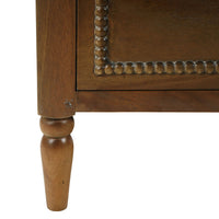 Close-up of mahogany chest leg detail.