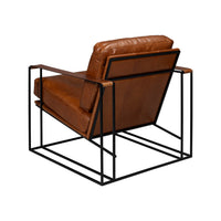 Back view of brown leather armchair, metal frame detail.