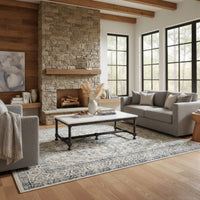 Coffee table in stylish living room setting.