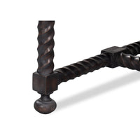 Close-up of table leg base detail.