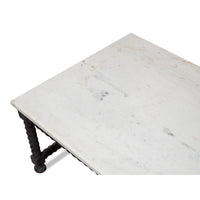 Close-up of marble tabletop corner.