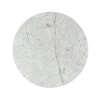 Close-up of round marble top of center table.