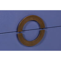 Circular handle detail on blue modern nightstand.