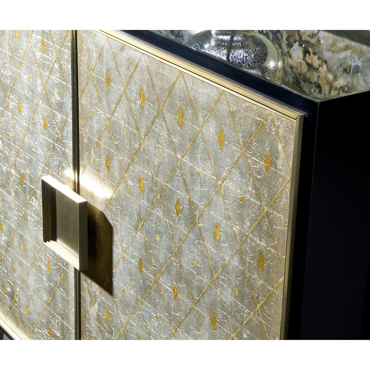 Close-up of decorative pattern on cabinet doors.