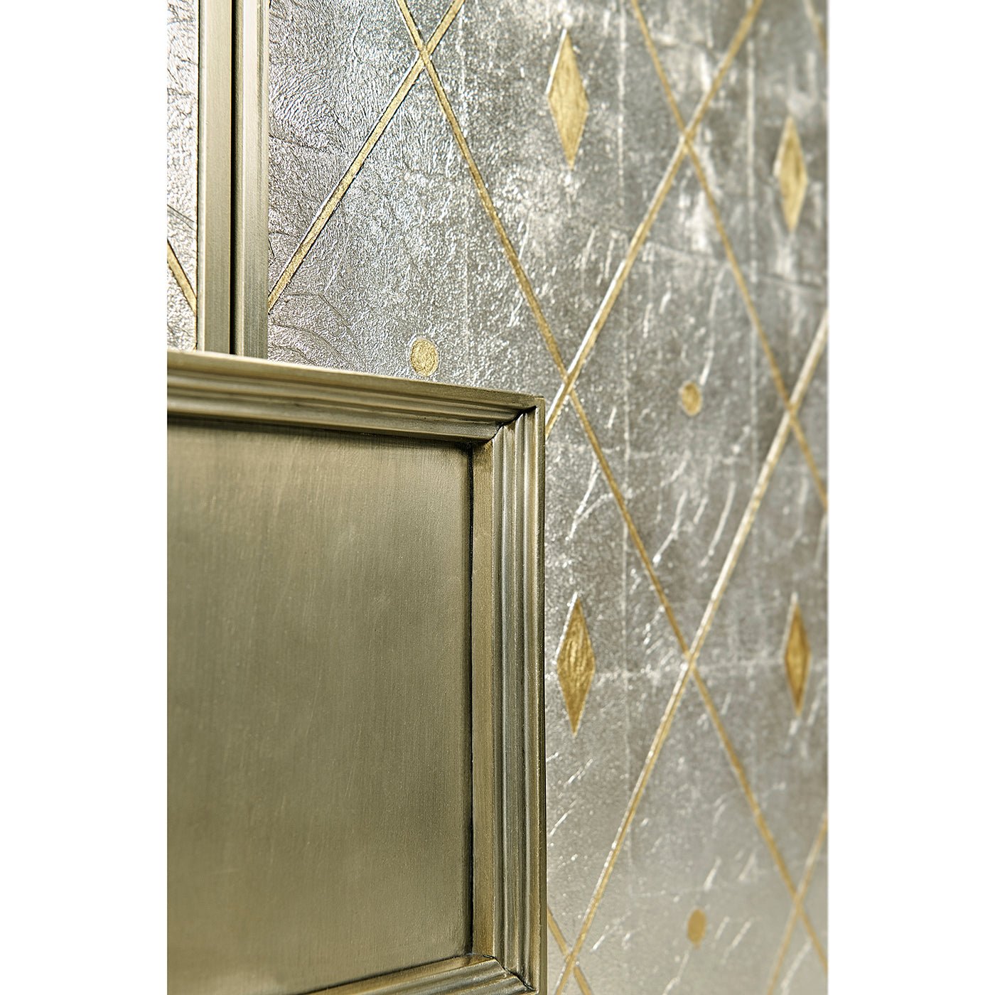 Detailed view of gold diamond pattern on cabinet.