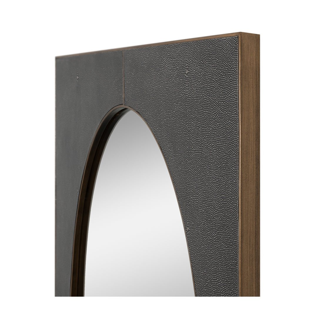 Detailed view of frame edge with mirror's leather texture.