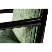 Close-up of upholstery and armrest on dining armchair.