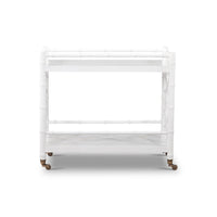 White mid-century bar cart, front view close-up.