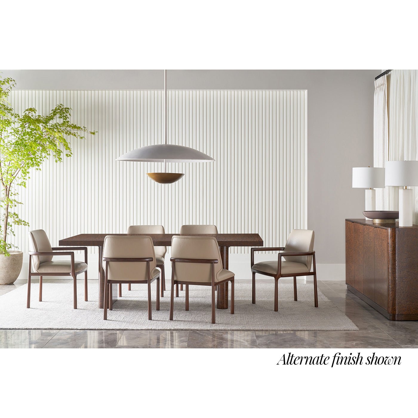 Dining table setup with chairs, alternate finish displayed.