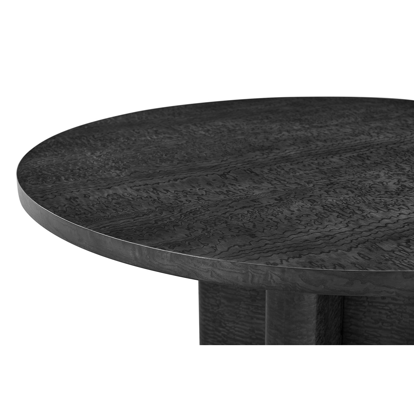 Detailed view of table's textured black Burl surface.