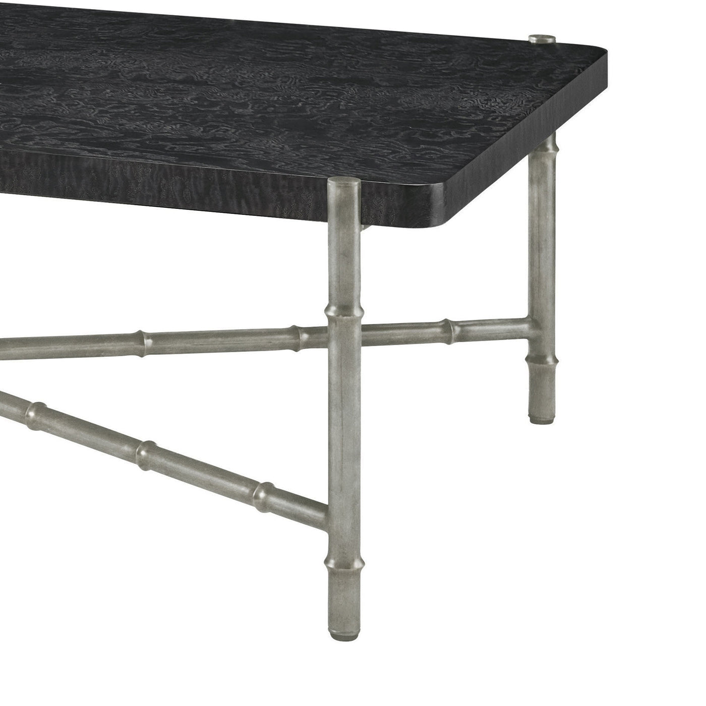 Close-up silver leg and black top coffee table detail