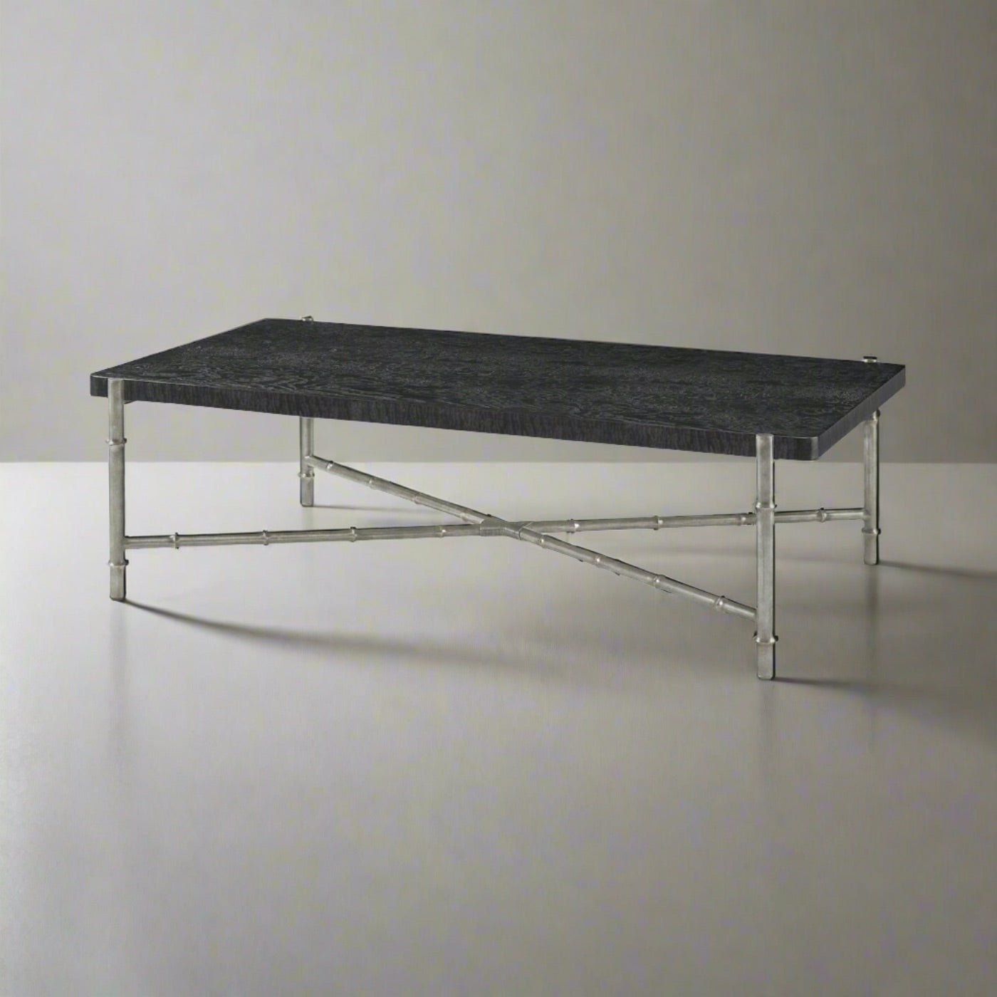 Black coffee table on display, neutral background