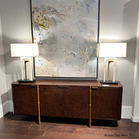 Brown burl wood sideboard, decorated with lamps, alternate finish.