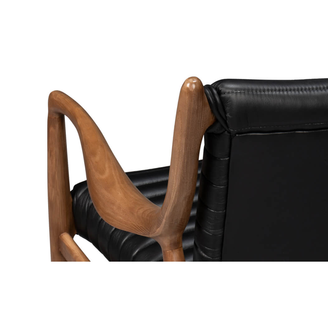 Mid-century accent chair armrest and back detail.