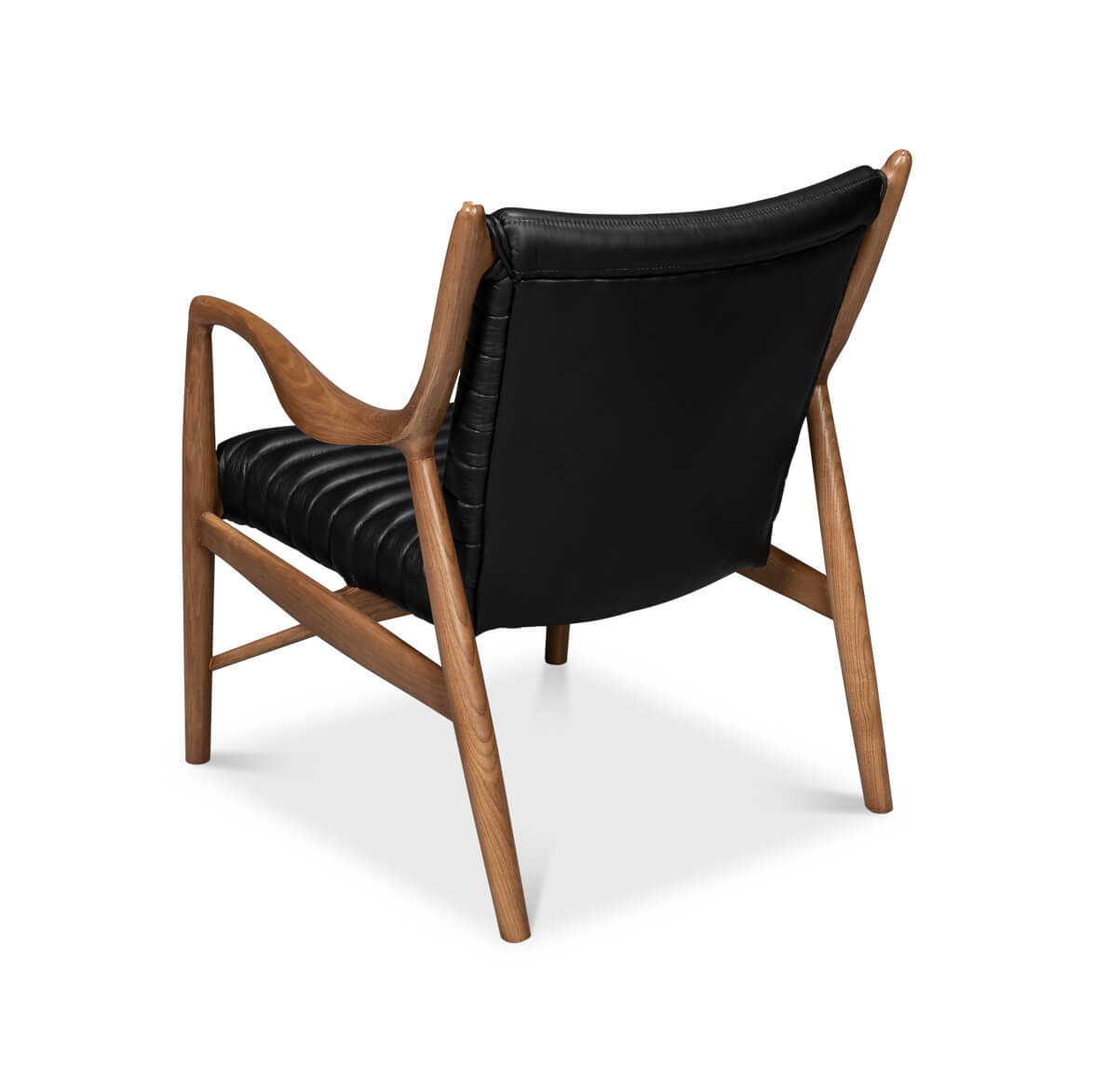 Mid-century black leather accent chair rear angled view.