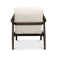 Mid-century boucle armchair back view.