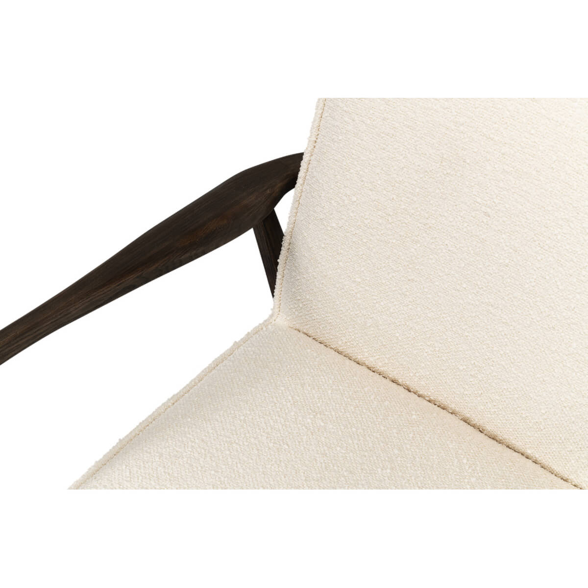 Mid-century boucle armchair close-up seat and backrest.