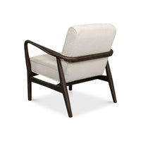 Mid-century boucle armchair rear angled view.