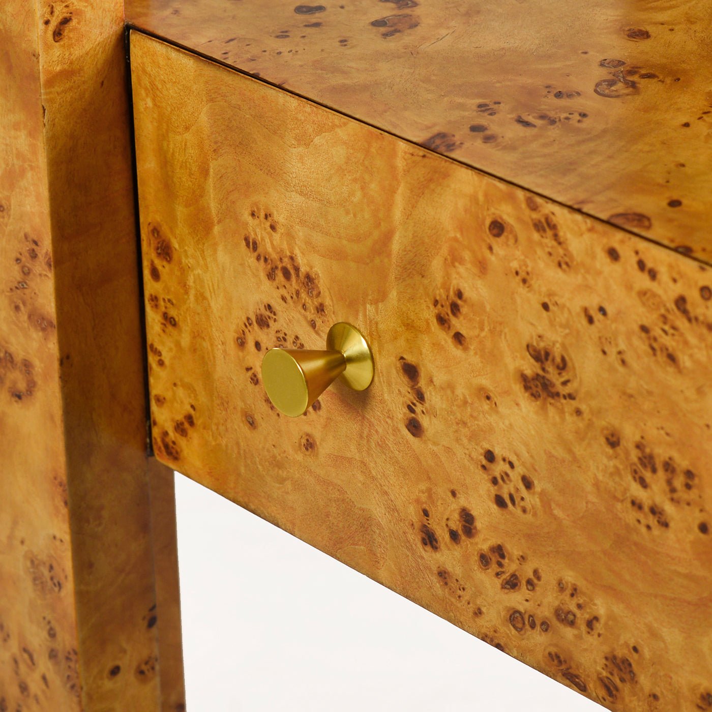 Drawer with handle on burl étagère bookshelf.