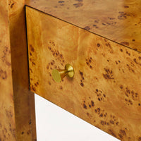 Drawer with handle on burl étagère bookshelf.