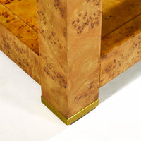 Bottom corner detail of burl étagère bookshelf.