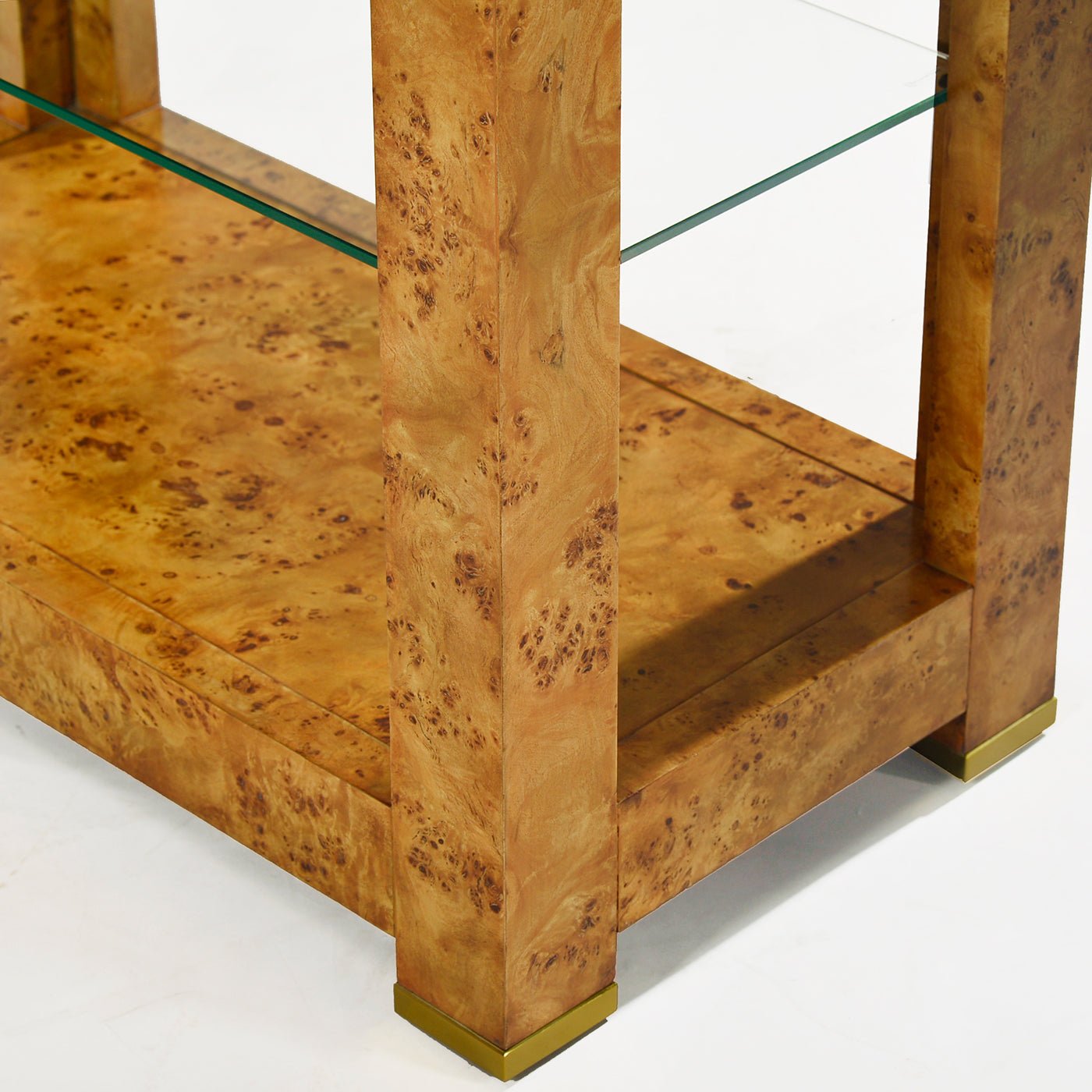 Lower section of burl étagère bookshelf with shelves.