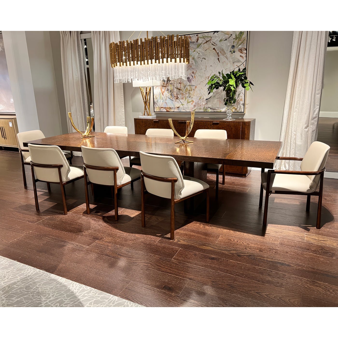 Elegant dining table setup in well-lit room.