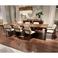 Elegant dining table setup in well-lit room.