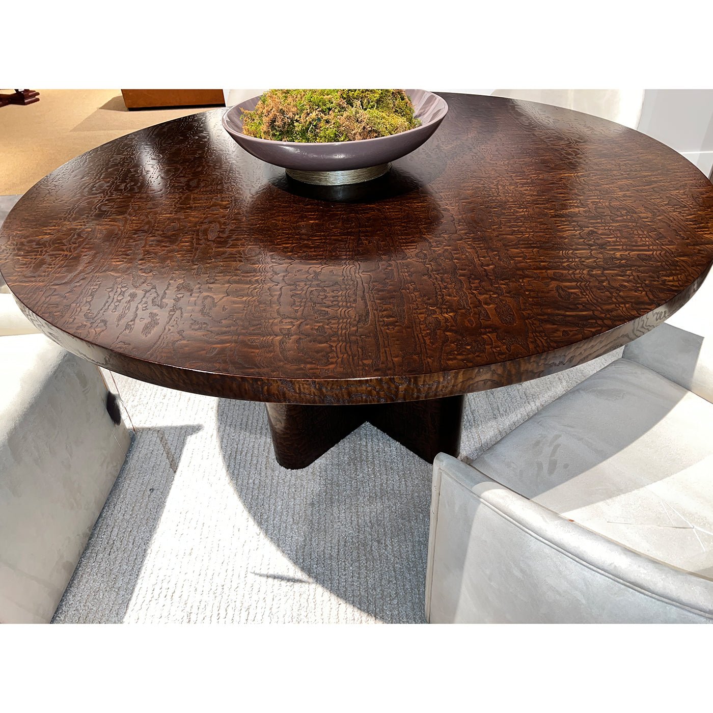 Close-up view of round dining table surface.