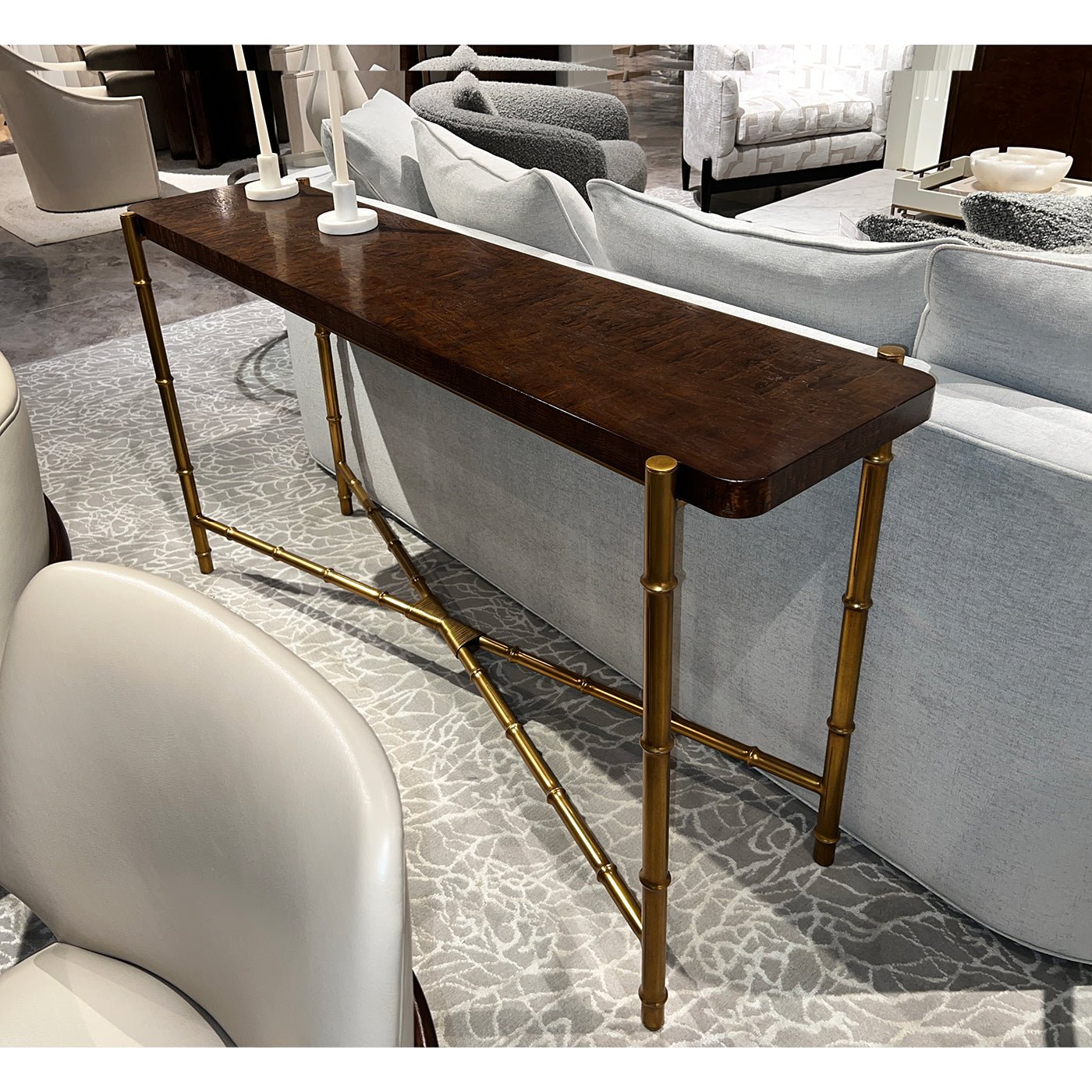 Console table styled in modern living room setting.